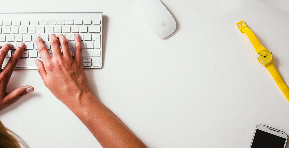 Image of hands on a keyboard